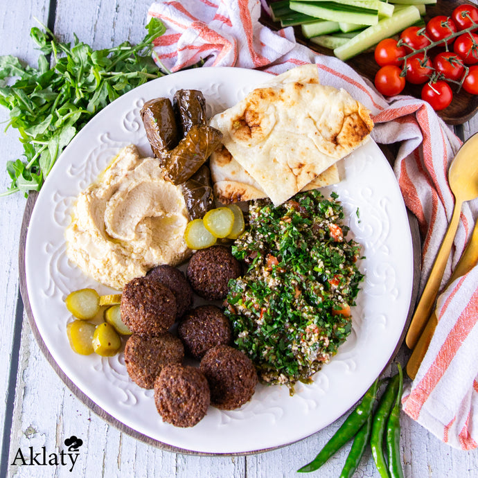 Falafel Platter(hummus, tabouleh, yalanji, pickles & bread)