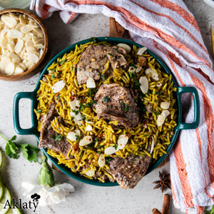 Spiced rice with minced meat topped with chicken